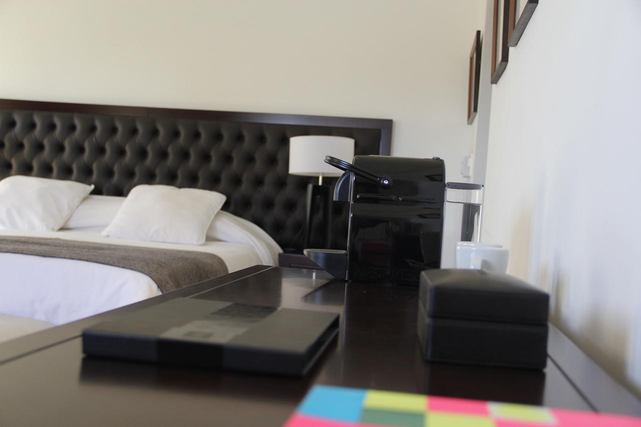 Real Hotel Lujan Extérieur photo